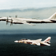 Illustration for article titled 27 high tension photos of NATO jets intercepting Russian warplanes